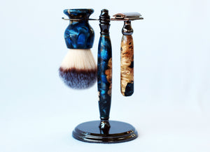 Buckeye Burl Shave Set with Dark Blue Resin, safety razor, 26mm lather brush and a matching shave stand.