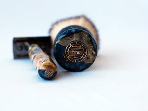 Buckeye Burl Shave Set with Dark Blue Resin, safety razor, 26mm lather brush and a matching shave stand.